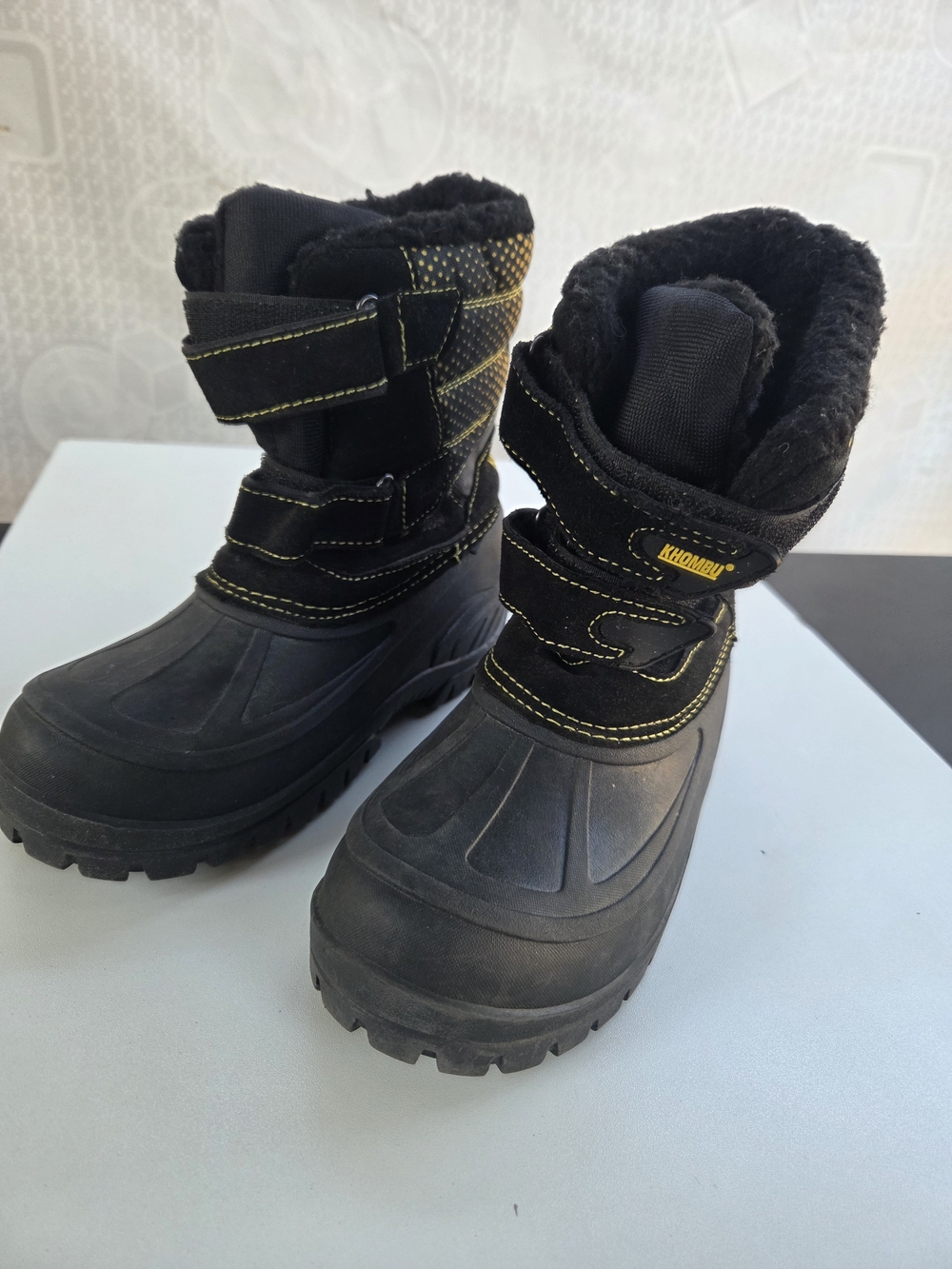 Khombu Kids Black Snow Boots with Yellow Stitching